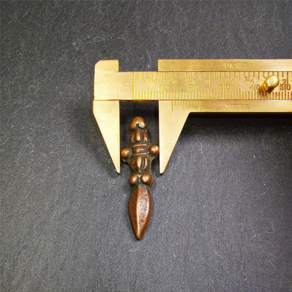 This type of old Dorje Phurba was collected in Labrang Monastery,blessed by lama, about 40 years old. The upper part is a vajra, and the lower part is a phurba，brown color,1.7 inches length