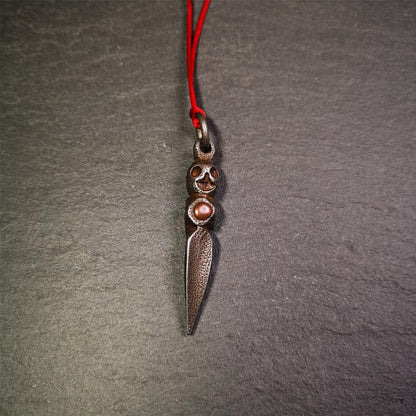 This phurba was made by Tibetan craftsmen and come from Hepo Town, Baiyu County,Tibet. Its upper part is Shmashana Adhipati skull, the lower part is a Dorje Phurba,and a copper dot inlaid on the waist of the phurba