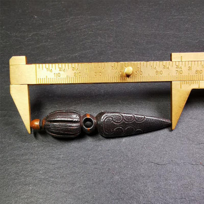 This handmade Dorje Phurba was crafted by Tibetan craftsmen from Hepo Town, Baiyu County, Tibet,known for its renowned Tibetan handicrafts. The upper part is a vajra, and the lower part is a phurba. A copper wire is inlaid on the waist of the phurba