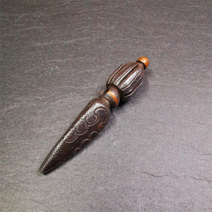 This handmade Dorje Phurba was crafted by Tibetan craftsmen from Hepo Town, Baiyu County, Tibet,known for its renowned Tibetan handicrafts. The upper part is a vajra, and the lower part is a phurba. A copper wire is inlaid on the waist of the phurba