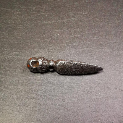 This phurba was made by Tibetan craftsmen and come from Hepo Town, Baiyu County, the birthplace of the famous Tibetan handicrafts. Its upper part is Shmashana Adhipati skull, the lower part is a Dorje Phurba, three copper dots inlaid on it