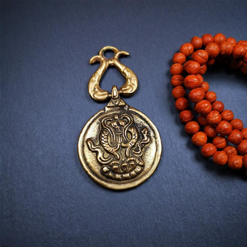 This Sipaho amulet was made by Tibetan craftsmen and come from Hepo Town, Baiyu County, Tibet.  It is round shape,made of brass.Front pattern is Tibetan Budhist calendar symbol - SIPAHO(srid pa ho),the back is the gold fish and treasure vase symbol.