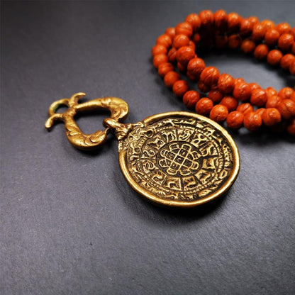 This Sipaho amulet was made by Tibetan craftsmen and come from Hepo Town, Baiyu County, Tibet.  It is round shape,made of brass.Front pattern is Tibetan Budhist calendar symbol - SIPAHO(srid pa ho),the back is the gold fish and treasure vase symbol.