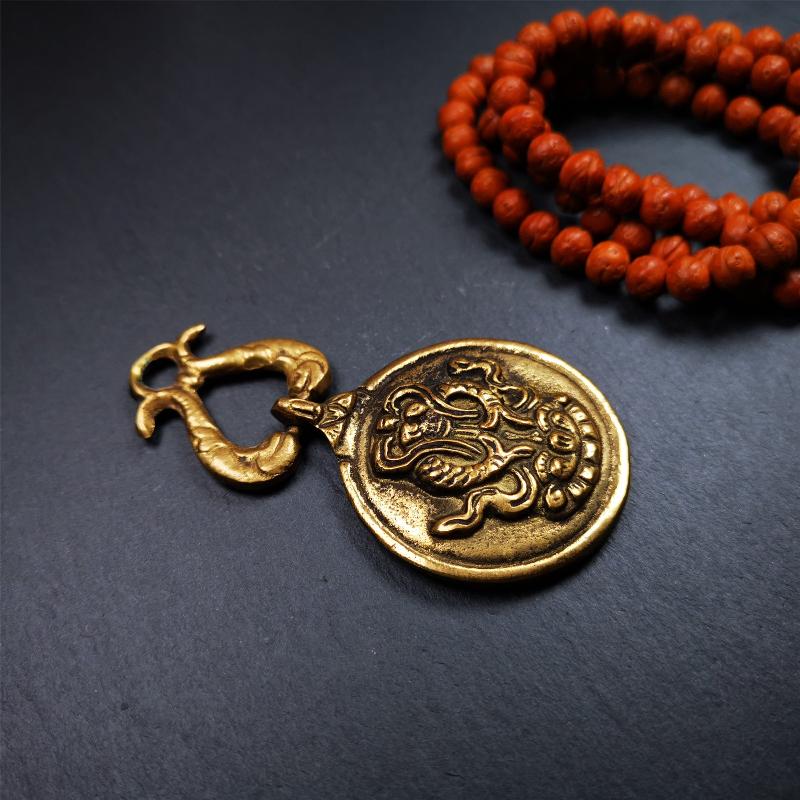 This Sipaho amulet was made by Tibetan craftsmen and come from Hepo Town, Baiyu County, Tibet.  It is round shape,made of brass.Front pattern is Tibetan Budhist calendar symbol - SIPAHO(srid pa ho),the back is the gold fish and treasure vase symbol.