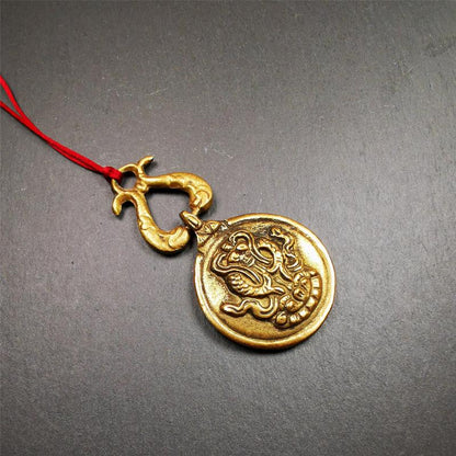 This Sipaho amulet was made by Tibetan craftsmen and come from Hepo Town, Baiyu County, Tibet.  It is round shape,made of brass.Front pattern is Tibetan Budhist calendar symbol - SIPAHO(srid pa ho),the back is the gold fish and treasure vase symbol.