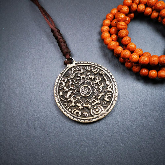 This unique Melong badge was collect from Kathok Monastery Tibet,about 60+ years old.It was sacred  amulets used by Kathok Monastery to present to believers,during a grand Dharma gathering,consecrated and blessed by lama.  It is made of thokcha,2.16 inch diameter,the front pattern is Tibetan Budhist calendar symbol - SIPAHO.