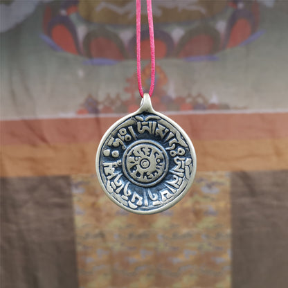 This Om badge amulet was collected from Yushu City Tibet,about 50 years old. It is round shape,made of lima brass, 1.58 inches,carved with mantra of chenrezig OM MANI PADME HUM. You can make it into a necklace, or a keychain, pendant