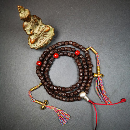 This old Rudraksha mala was handmade from tibetan crafts man in Baiyu County. It's composed of 108 pcs 8mm Rudraksha beads,with agate beads,1 pair of bead counters,and guru bead.