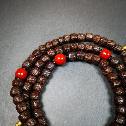 This old Rudraksha mala was handmade from tibetan crafts man in Baiyu County. It's composed of 108 pcs 8mm Rudraksha beads,with agate beads,1 pair of bead counters,and guru bead.