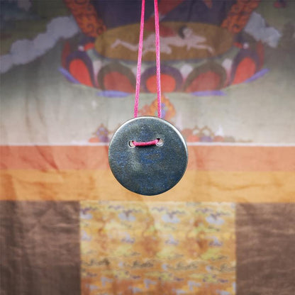This Usnisa Vijaya statue was collected from Derge,Tibet. It's a badge or pendant,made of copper,brown color, 1.4 inch diameter. You can make it into a necklace,or bag hanging,or just put into your shrine.