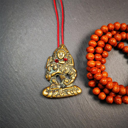 This Vajrasattva statue was collected from Derge,Tibet. It's a badge or pendant,made of copper,brown color, size is 2.24" × 1.57". You can make it into a necklace,or bag hanging