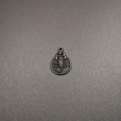 This scorpion amulet is made by Tibetan craftsmen in Hepo Township, Baiyu County, the birthplace of the famous Tibetan handicrafts. It is made of thokcha, size is 0.8 inches. You can make it into a necklace, or a keychain, or just put it in your shrine.