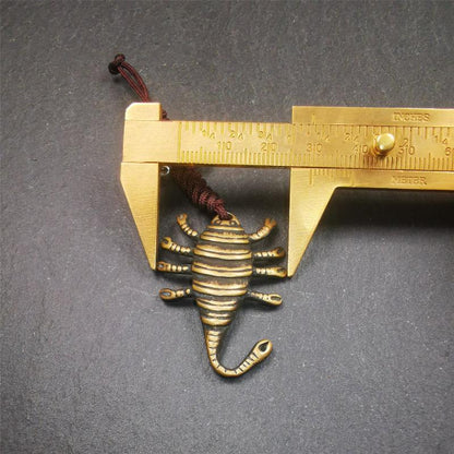 This scorpion amulet is collect from Baiyu Tibet,it is made of brass,yellow color,size is 1.57 inch. You can make it into a necklace pendant, bag hanging,keychain, or just put it on your desk,as an ornament.