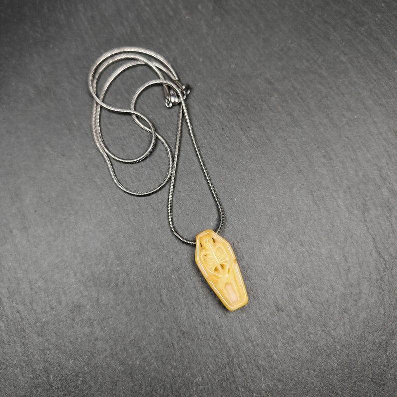 Yak Bone Carved Skeleton Pendant,32mm × 15mm - Gandhanra-ART