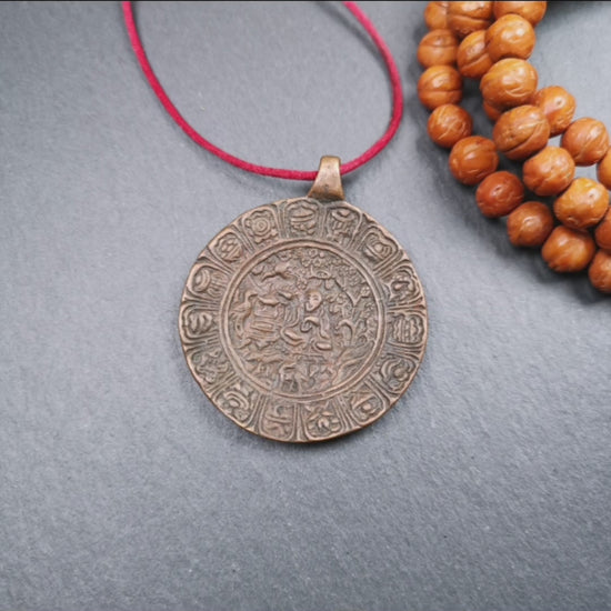 This old Longevity Badge was collected from Ganzi County Tibet about 100 years. It is made of copper,the theme is Shou-lao(the god of longevity) surrounded by the symbols of Ashtamangala. He is the ancient Chinese God of Longevity, represent Amitayus