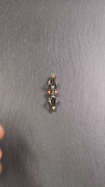 This unique vajra pendant was handmade by Tibetan craftsmen from Tibet in 1990's,from Hepo Town, Baiyu County, the birthplace of the famous Tibetan handicrafts. It is five-pronged Vajra,made of cold iron, 1.77 inch height.Comes with leather cord. You can make it a necklace, pendant, keychain, mala pendant, or just as an ornament on your desk.